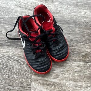 Kids Black and Red Nike Tempo indoor soccer shoes